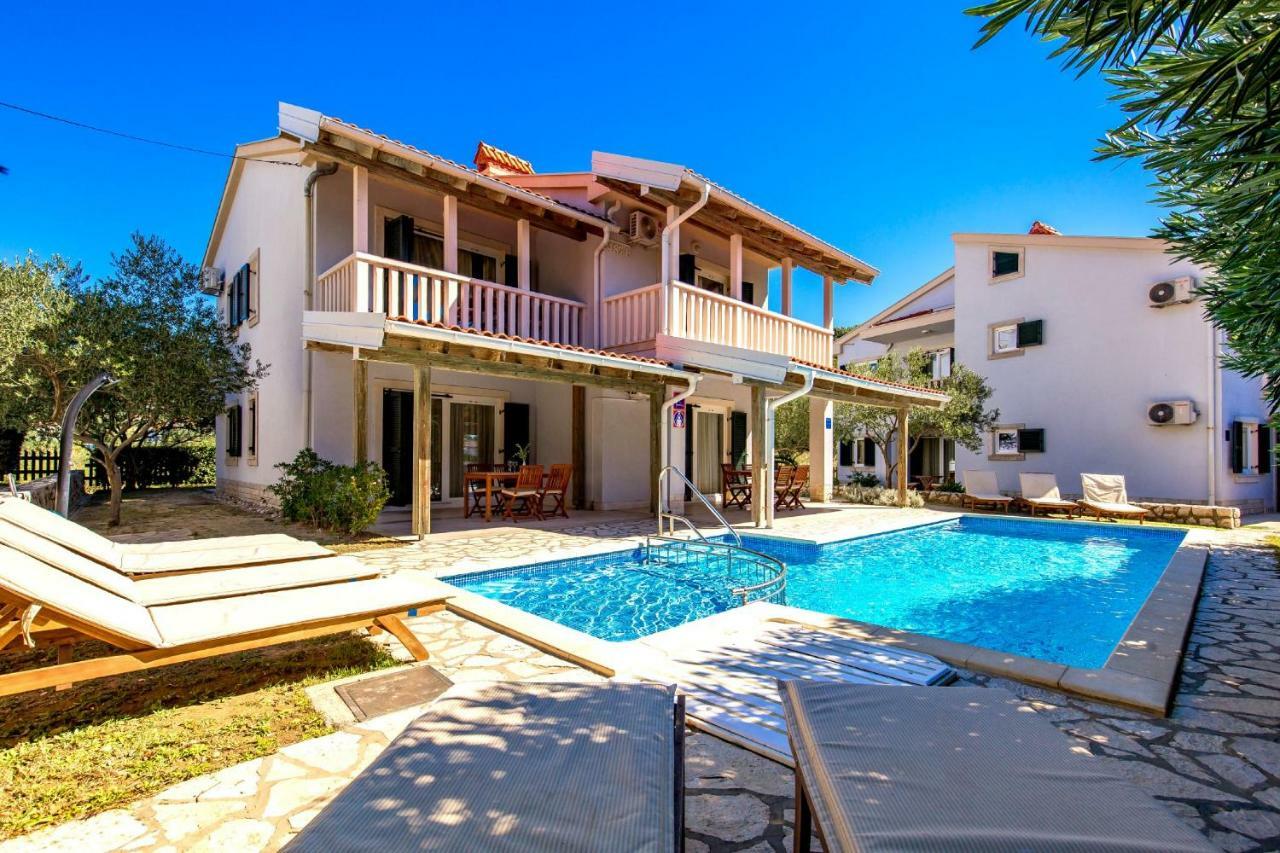 Villas Rab Palit Exteriör bild